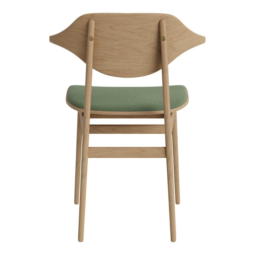 Wooden chair with a light oak finish and a soft green patterned seat. Elegant, modern design.