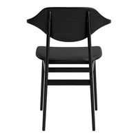 Black wooden chair with a minimalist design and smooth finish, featuring subtle curves and a sleek silhouette.