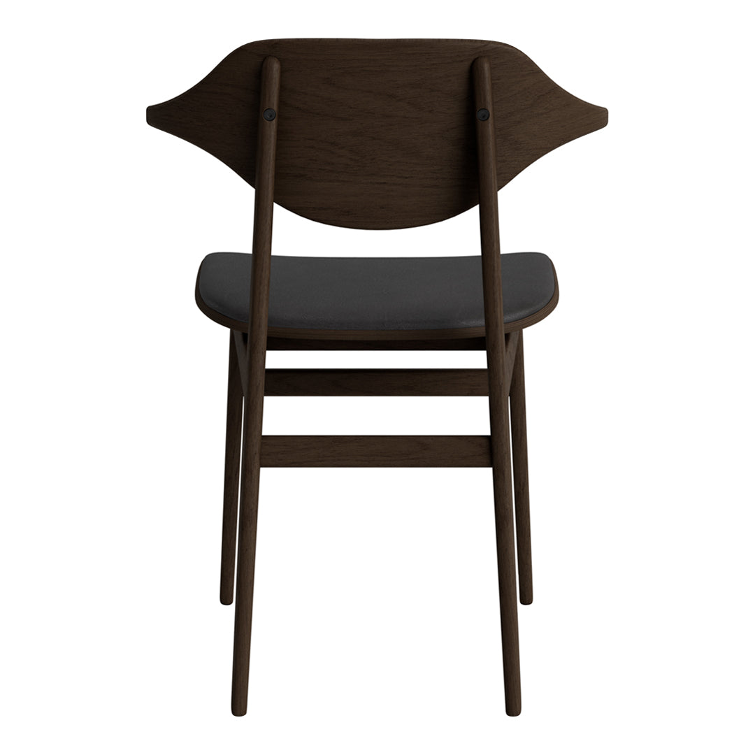 Dark wooden chair with a smooth black seat and a unique, curved back design, showcasing a minimalist aesthetic.