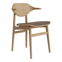 Light oak chair with a smooth, brown seat and minimalist design. Elegant natural wood grain pattern.