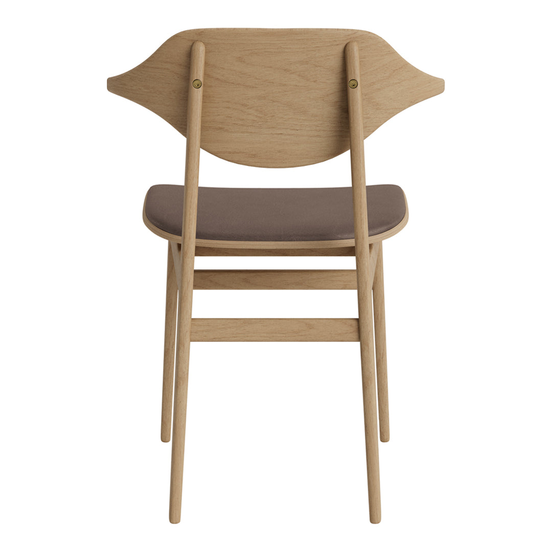 Natural wood color chair with a smooth, dark brown seat and a unique leaf-shaped backrest design.