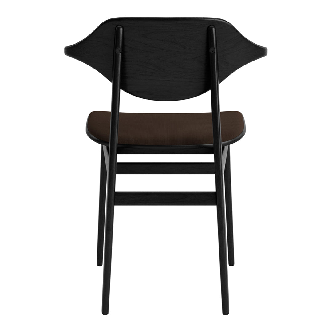 Black chair with a smooth brown seat and a unique curved backrest design.