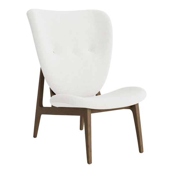 White upholstered chair with tufted backrest and mid-century wooden legs. Clean, modern design adds elegance to any space.