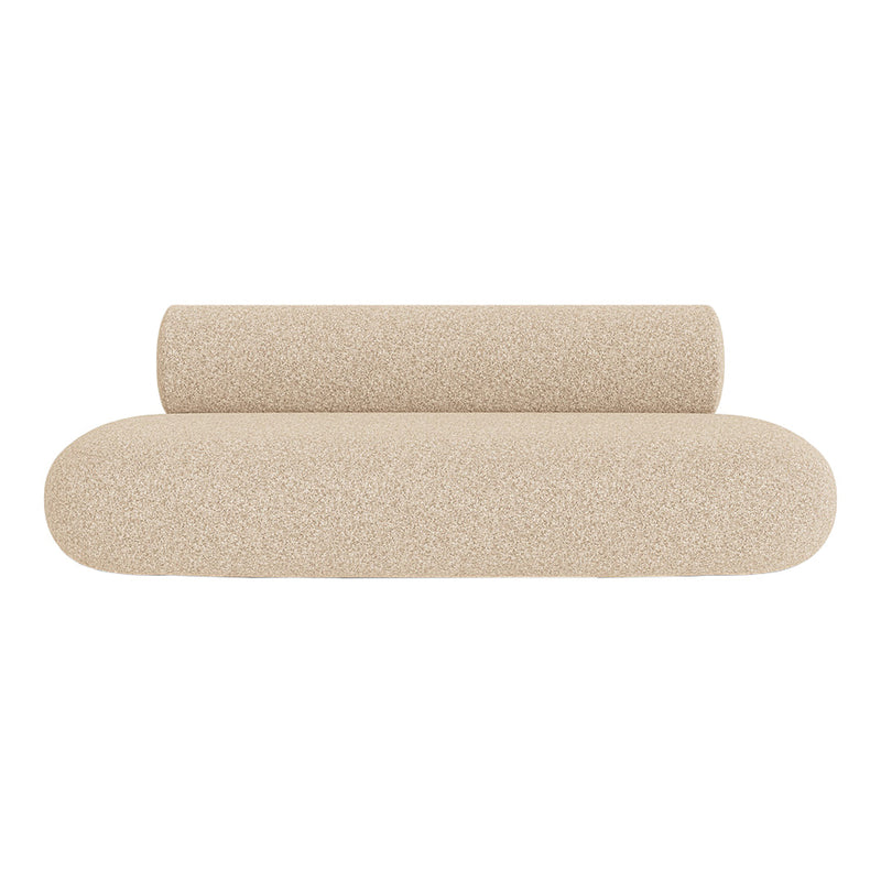 Beige yoga bolster with textured pattern, featuring two distinct shapes for versatile support and comfort.