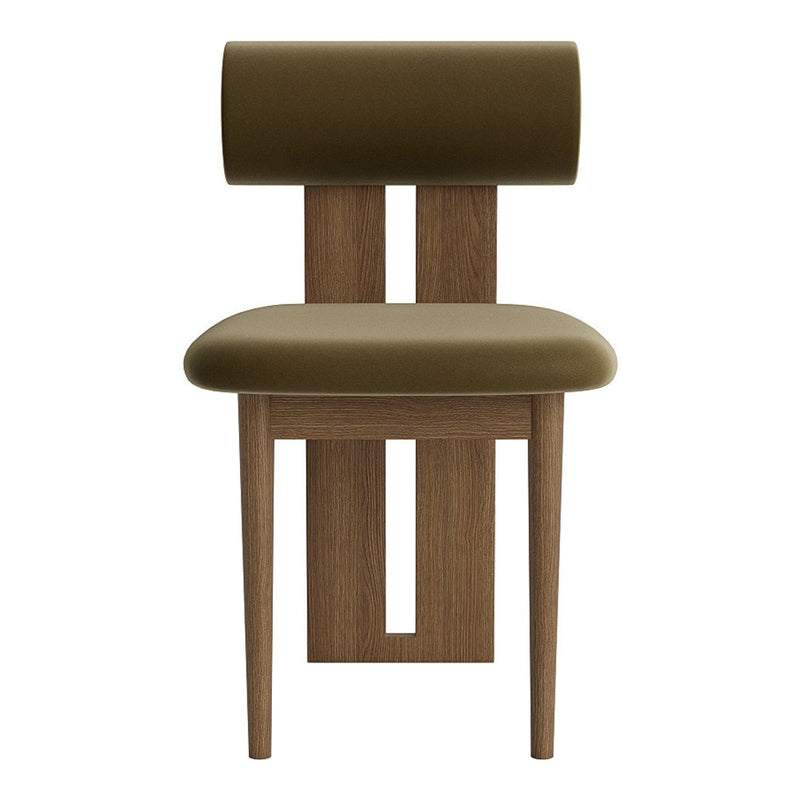 Green upholstered chair with a minimalist wooden frame, featuring a sleek, cylindrical backrest and clean lines.