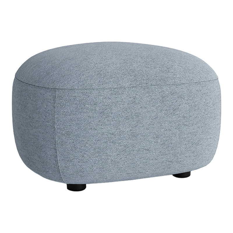 Soft blue upholstered ottoman with a smooth, rounded shape and subtle texture, resting on black legs.