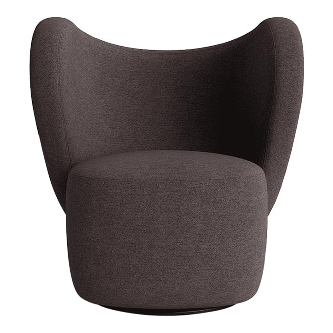 Brown upholstered accent chair with a smooth, rounded design and soft fabric texture. Ideal for modern decor.