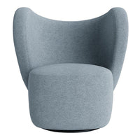 Soft blue accent chair with a textured fabric and contemporary, curved design. Ideal for modern interiors.