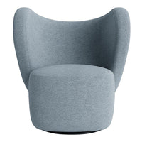 Soft blue accent chair with a textured fabric and contemporary, curved design. Ideal for modern interiors.