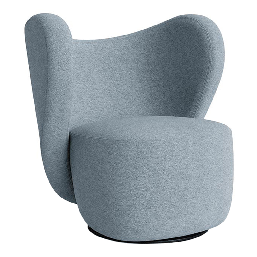 Soft blue accent chair with a modern, curved design and textured fabric. Ideal for contemporary decor.