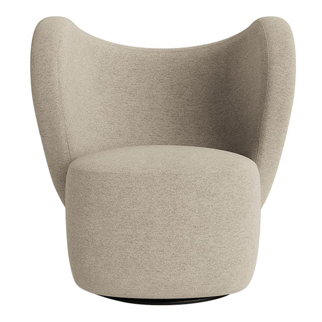 Beige contemporary armchair with a smooth, textured fabric and rounded design, perfect for modern interiors.