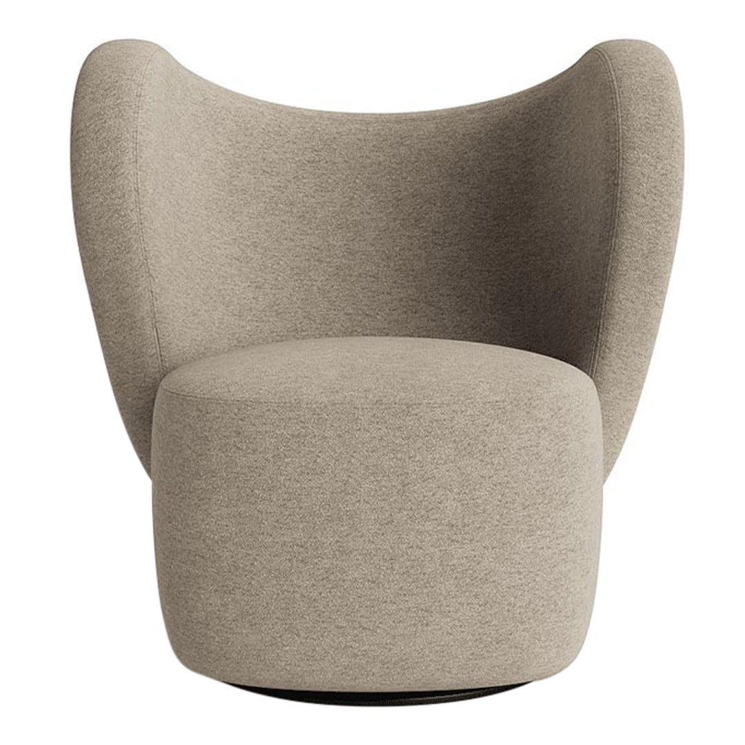 Beige upholstered chair with a smooth, rounded design and soft texture, perfect for modern decor.
