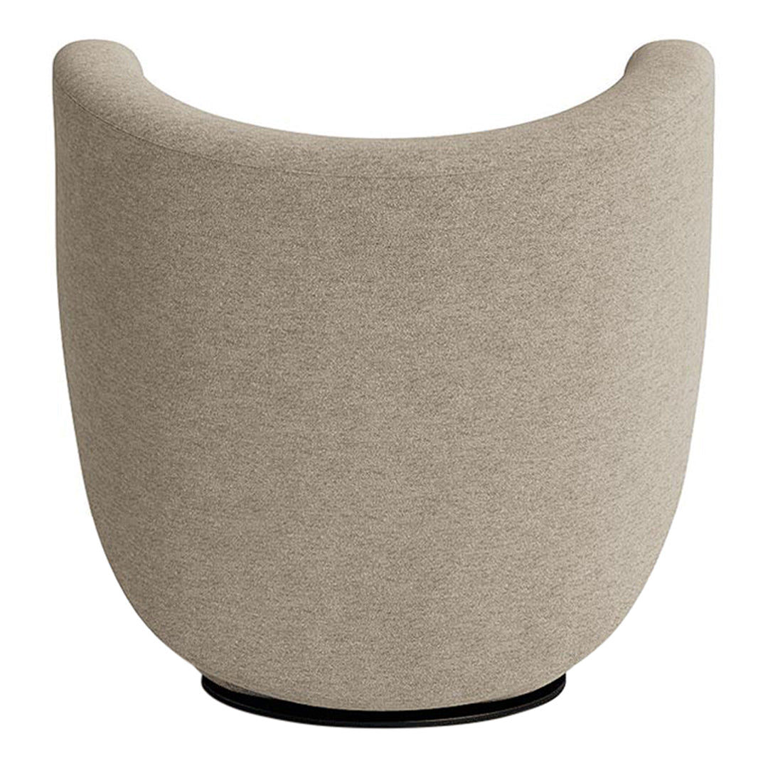 Beige upholstered chair with a curved design, featuring a textured fabric and a black base. Modern and minimalist style.