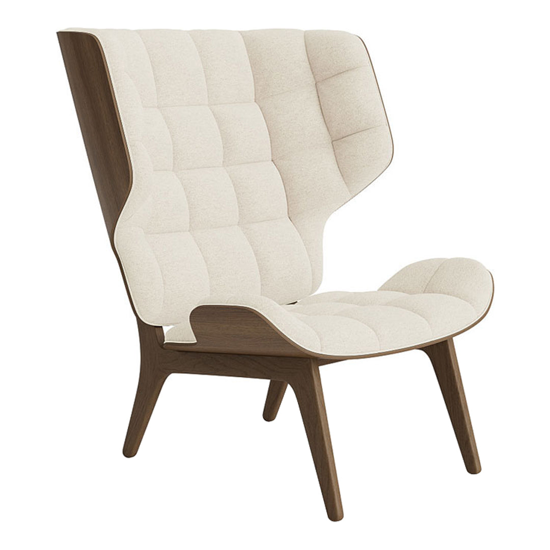 Cream quilted upholstery with walnut wood legs, modern design. Perfect for stylish living spaces.