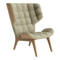 "Light olive green upholstered chair with a textured grid pattern and wooden legs."