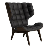 Black tufted armchair with a sleek design and wooden legs, featuring a modern minimalistic pattern.