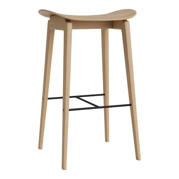 Light wooden bar stool with a smooth finish and minimalist design, featuring natural wood tones and a sleek black footrest.