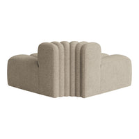 Beige sectional sofa with a ribbed pattern, featuring a modern and soft texture. Ideal for contemporary living spaces.