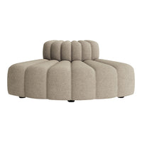 Beige plush sofa with a curved, ribbed design, featuring round and smooth shapes for a modern aesthetic.