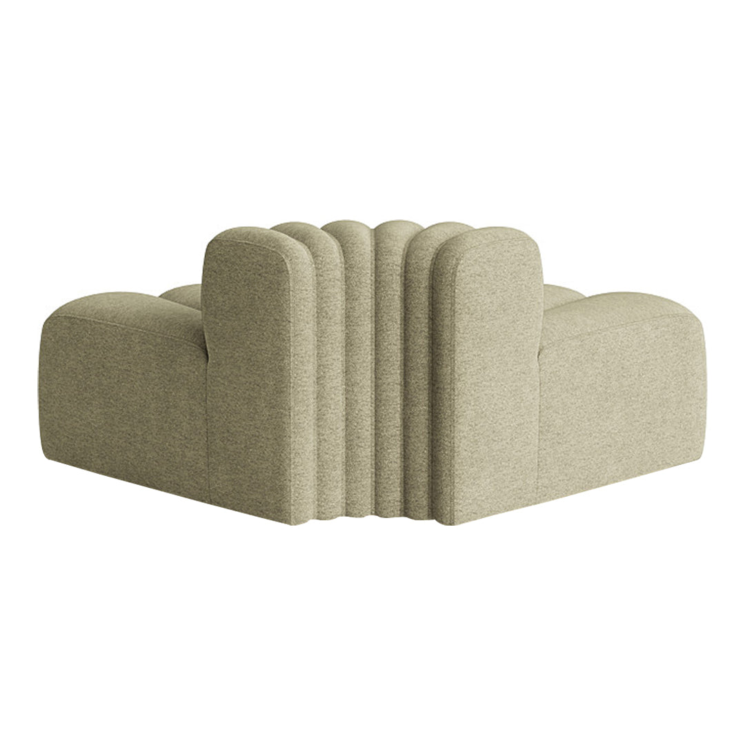 Light beige corner sofa with plush, curved lines and a textured fabric design showcasing modern elegance.