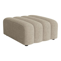Beige fabric ottoman with a smooth texture and curved contour design, perfect for modern decor.