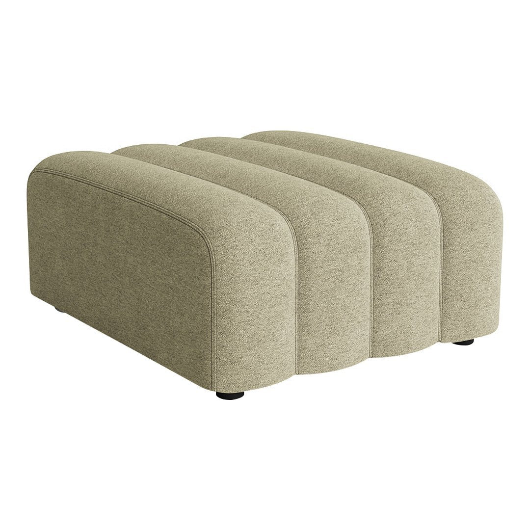 Soft beige upholstered ottoman with a smooth, rounded design and subtle textured pattern. Perfect for modern interiors.
