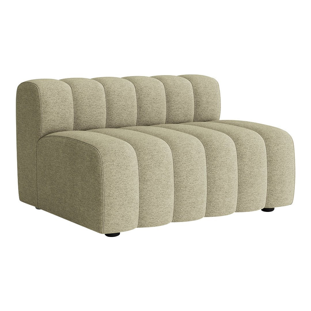 Beige curved sofa with textured tufted design and soft, rounded edges, perfect for modern decor.