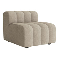 Beige fabric accent chair with a smooth, rounded design and subtle tufted pattern, ideal for modern decor.