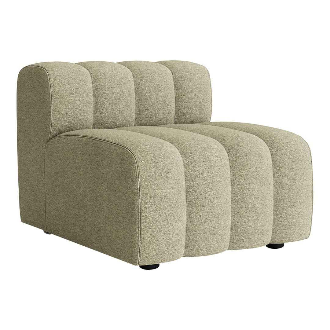 Light olive green accent chair with a tufted design and smooth, rounded edges. Perfect for modern decor.