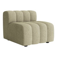 Light olive green accent chair with a tufted design and smooth, rounded edges. Perfect for modern decor.