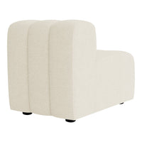 Beige modular sofa with a smooth, textured finish and rounded back design, ideal for modern decor.