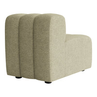 Light beige upholstered chair with smooth, curved lines and a textured fabric finish. Soft, minimalist design.