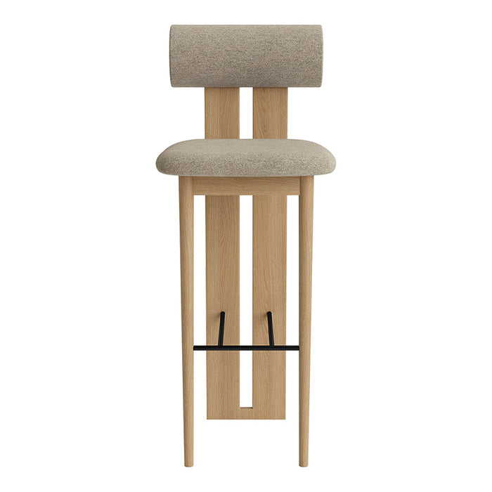 Neutral beige fabric bar stool with geometric wooden design and black metal footrest, perfect for modern interiors.