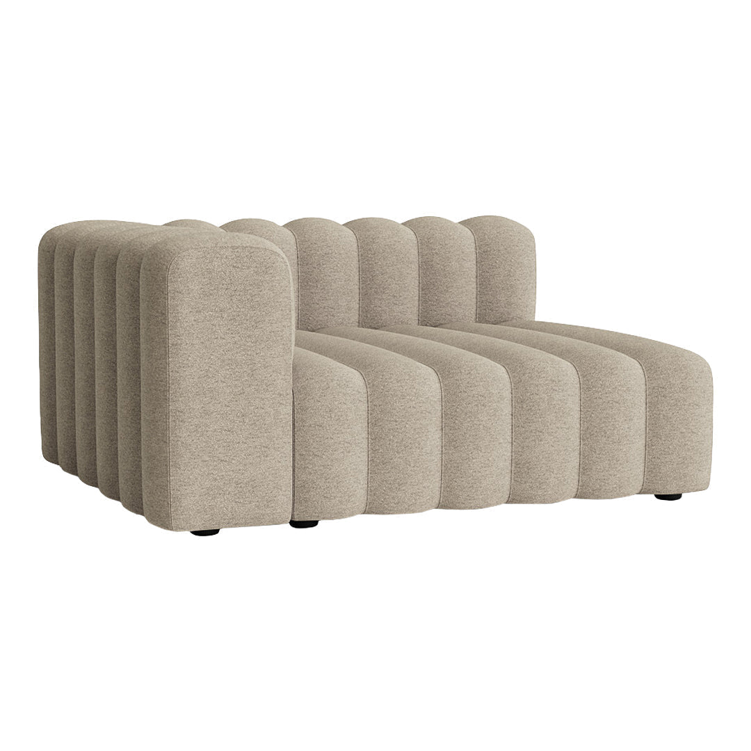 Beige curved sofa with subtle ribbed texture, ideal for modern living spaces.