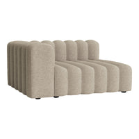Beige curved sofa with subtle ribbed texture, ideal for modern living spaces.