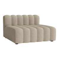 Beige sectional sofa with soft, curved lines and a textured pattern for a modern aesthetic.