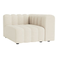 Beige, textured fabric sectional sofa with wavy pattern and rounded edges, offering a modern and cozy look.