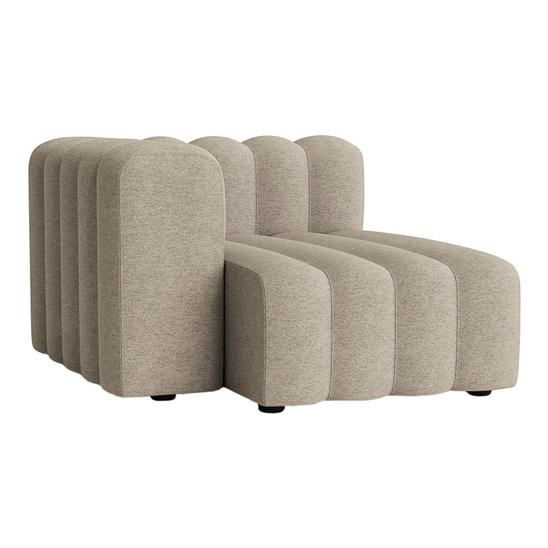 Beige modular sofa with a modern, curved design and smooth fabric texture, perfect for contemporary interiors.