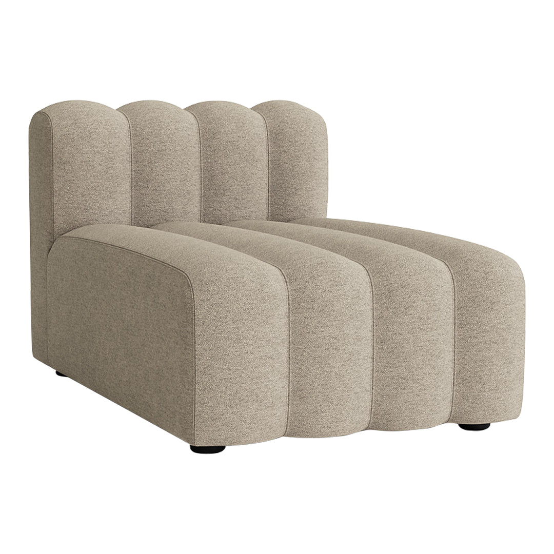 Beige modular sofa with a textured fabric and rounded, wave-like patterns for contemporary decor.