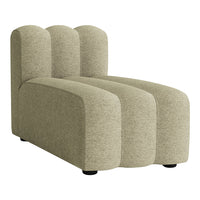 Textured beige upholstered chaise lounge with a sleek, modern design and soft, curved contours.