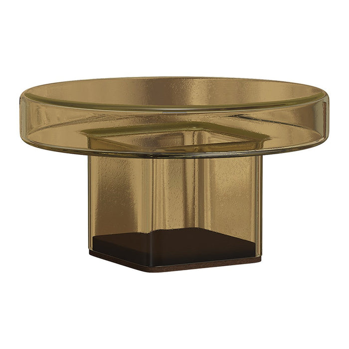 Stylish round coffee table in amber glass with dark wooden base. Modern design with smooth, glossy finish.