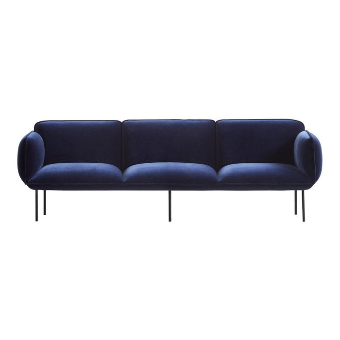 Elegant navy blue velvet sofa with sleek black legs and smooth curved arms. Perfect for modern interiors.
