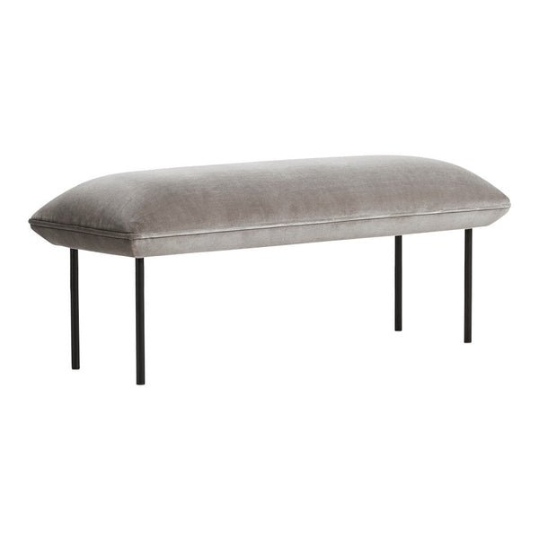 Gray velvet bench with a smooth, plush surface and sleek black metal legs, perfect for modern decor.