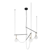 Modern chandelier featuring black metal, brass accents, and white globe shades for a stylish contrast.