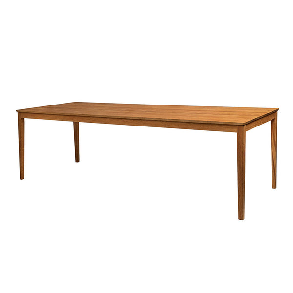 Natural wood dining table with a smooth, light brown finish and clean, minimalist lines.