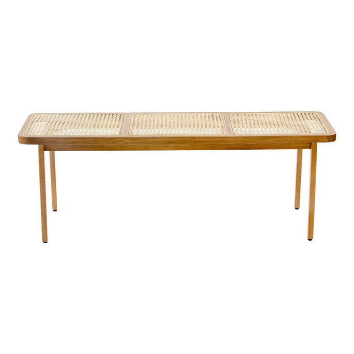 Wooden bench with a natural bamboo finish and woven cane pattern on top. Ideal for modern or bohemian decor.