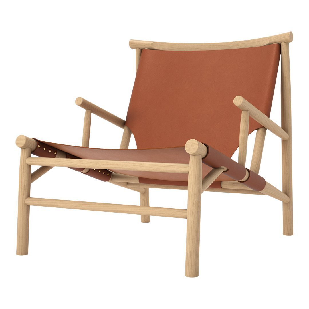 Brown leather lounge chair with light wooden frame, showcasing a minimalist design and natural color palette.