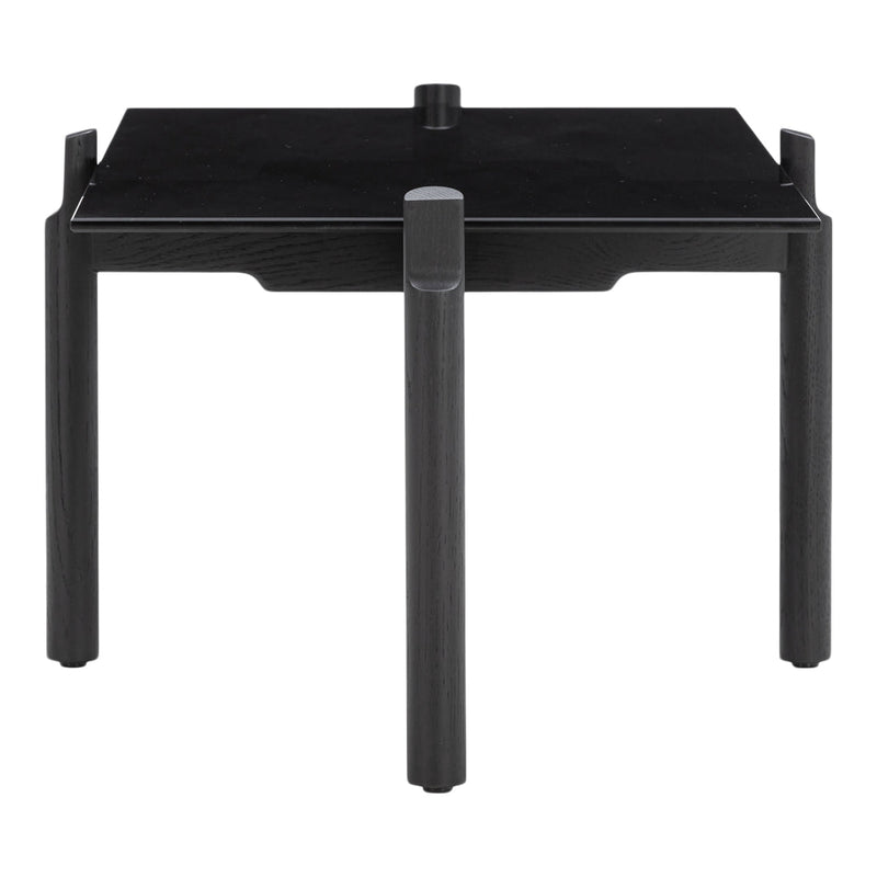 Black square table with a minimalist design and smooth surface, featuring four sturdy legs. Ideal for modern decor.