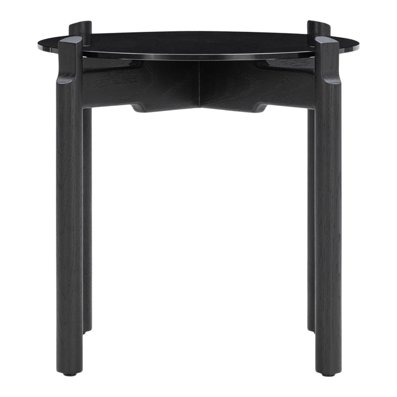 Black round table with a sleek, modern design featuring a smooth surface and sturdy legs. Perfect for contemporary decor.
