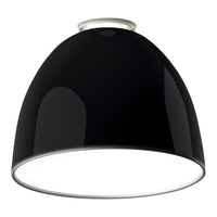 Sleek black dome pendant light with a glossy finish and white interior for a modern touch.